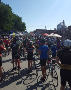 Riders filtering through town.
